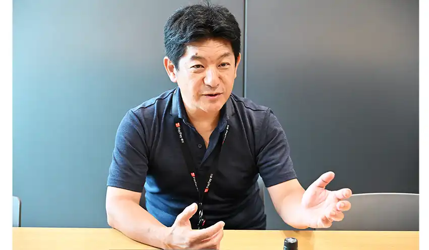 インタビューに応じる田鎖社長